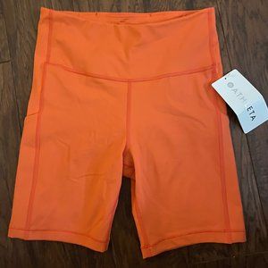 **Athleta Ultimate Stash 7 Orange Shorts, NWT